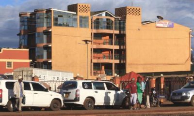 Residents outside a new hotel in Marsabit town.